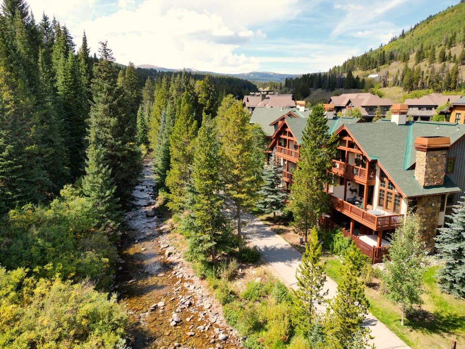The recreation path and creek run right behind the home.