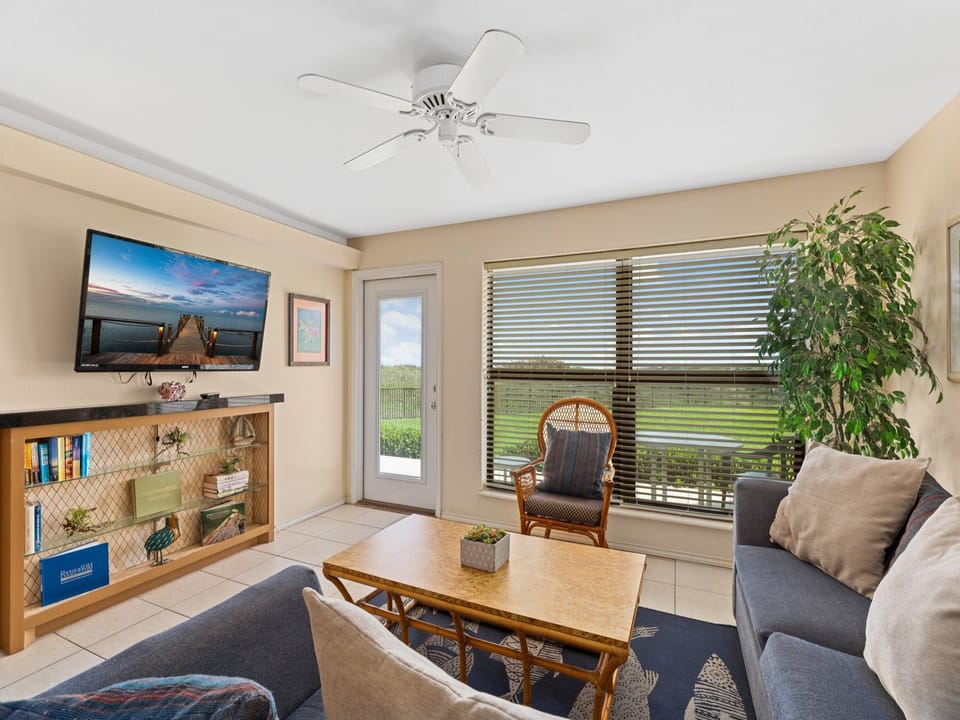 Living area surrounds a flat screen TV