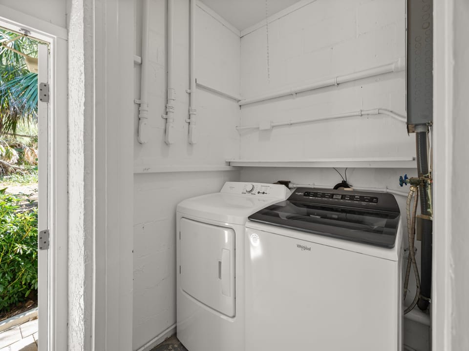 Your dedicated laundry room keeps your vacation wardrobe fresh with full-size washer and dryer, plus convenient storage shelves.