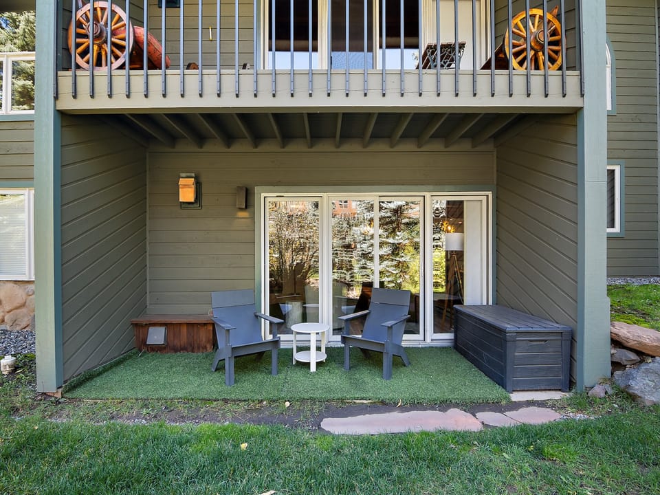 Great covered porch off the living room that is just steps from the river, enjoy a beverage while listening to the river.