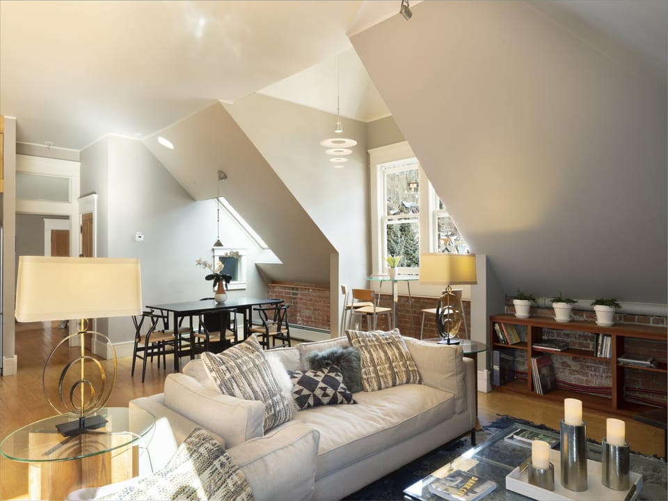 Cozy open living space with ample couch space to relax, read a book, catch a movie or take a snooze after a long day in the mountains.