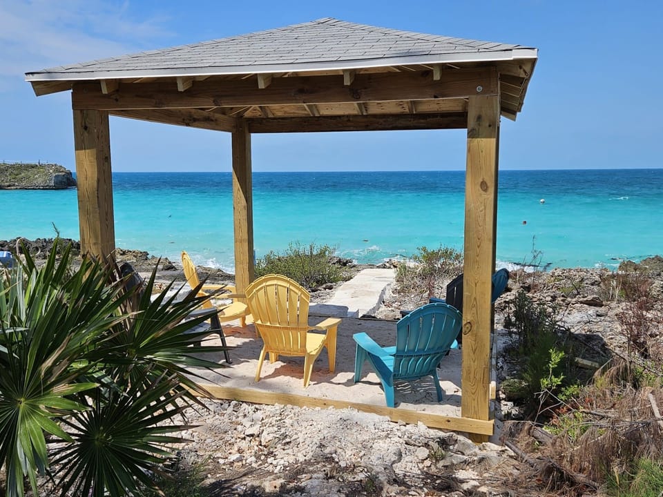 Cabana overlooking the Caribbean, enjoy the breeze, and sounds of lapping waves and sunset views.