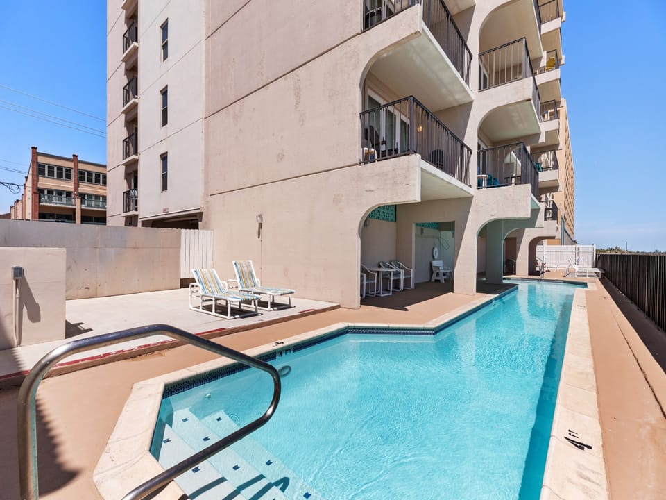 Large Sparkling Community Pool facing the beach