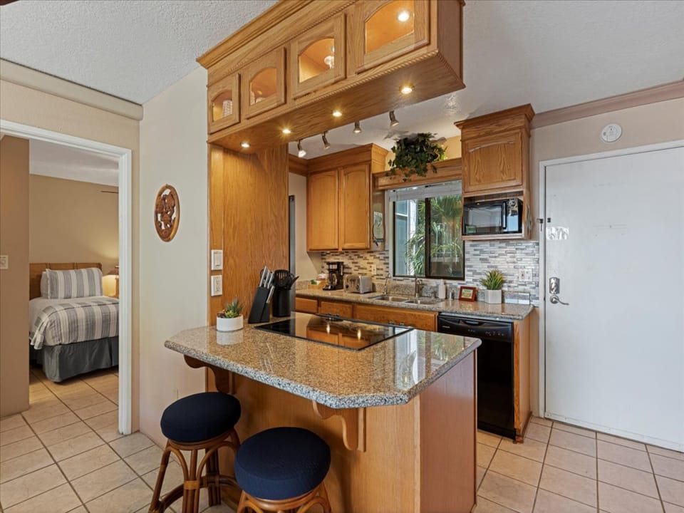 Kitchen area with seating at the counter