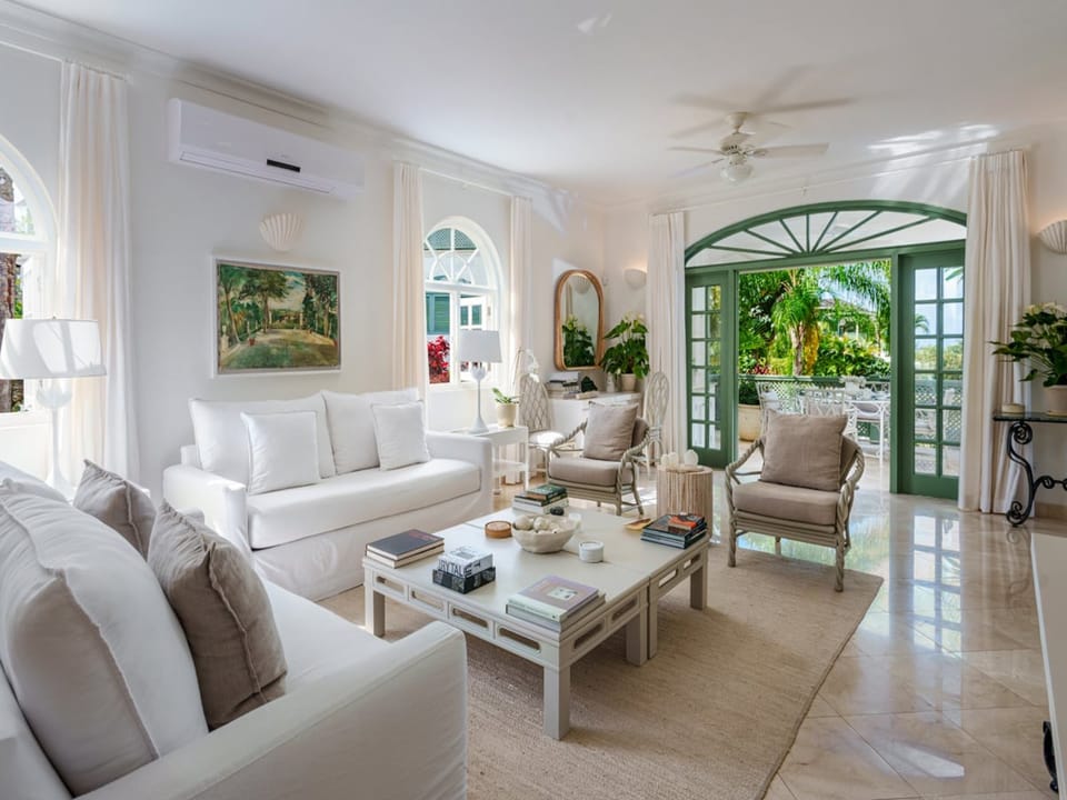 Air-conditioned living room opens onto a spacious terrace