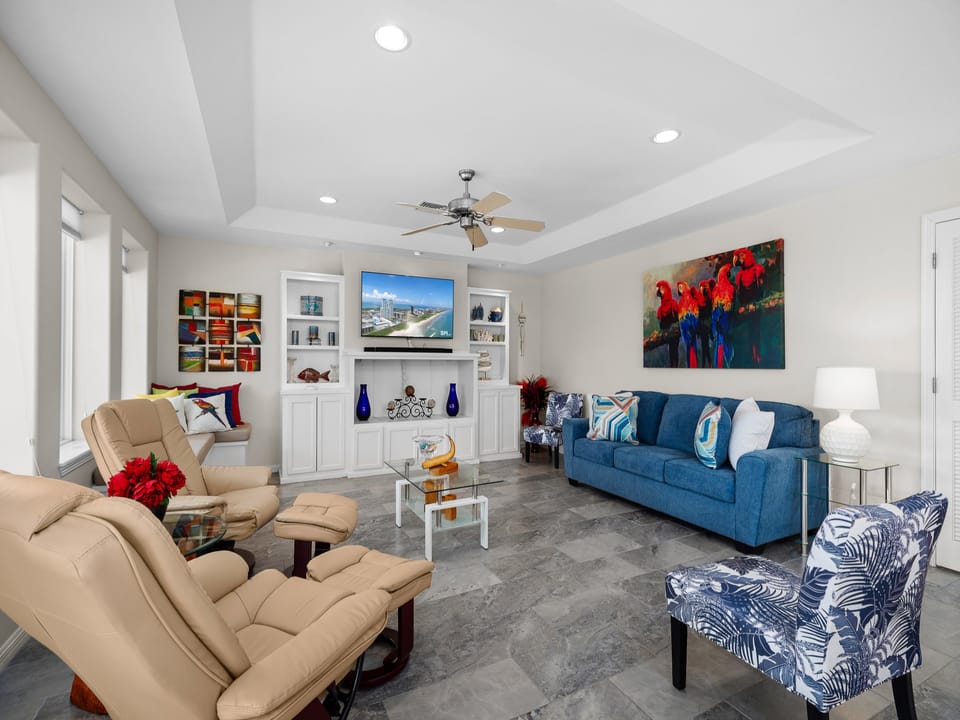 2nd Floor spacious living area surrounding a Flat Screen TV