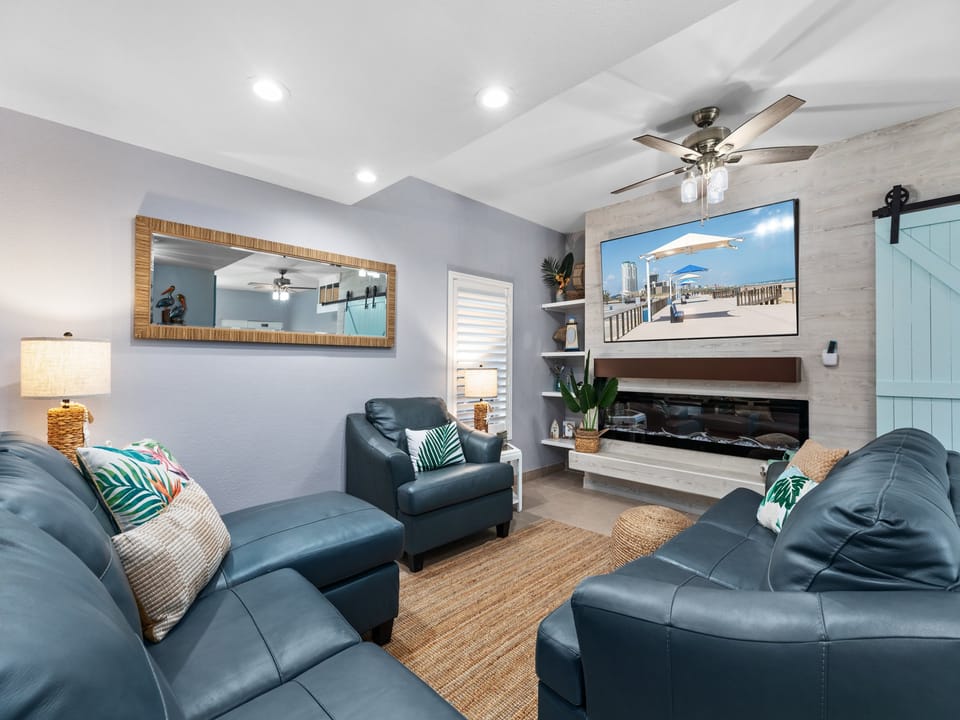 Living area surrounds a large flat screen TV!