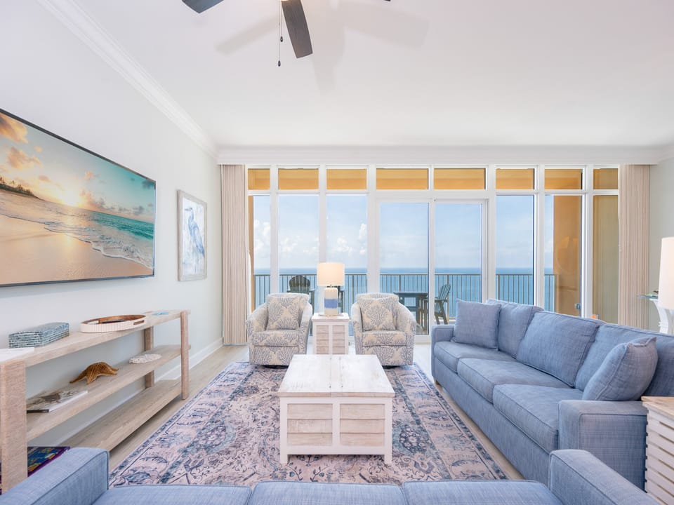 Settle into patterned armchairs, admire coastal artwork, and listen to waves from the gulf