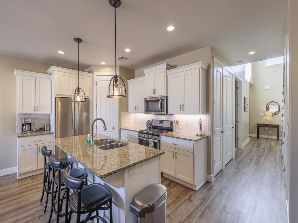 Kitchen view showing you hallway to entry way