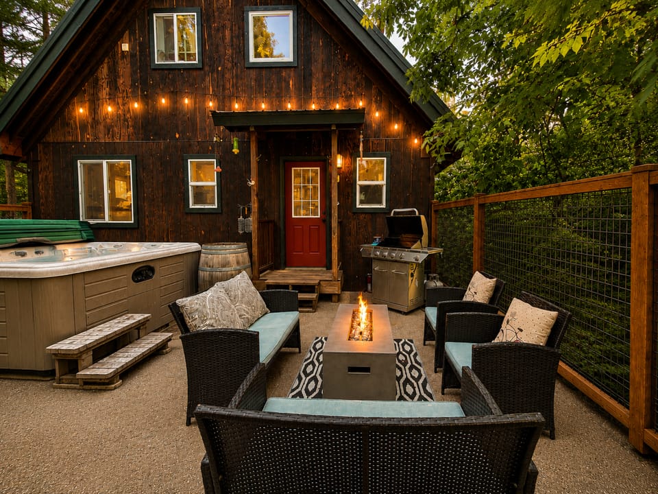 Fenced in back patio space includes propane grill and propane firepit along with your own private hot tub under the stars. Keep Fido safe in this full enclosed patio space.
