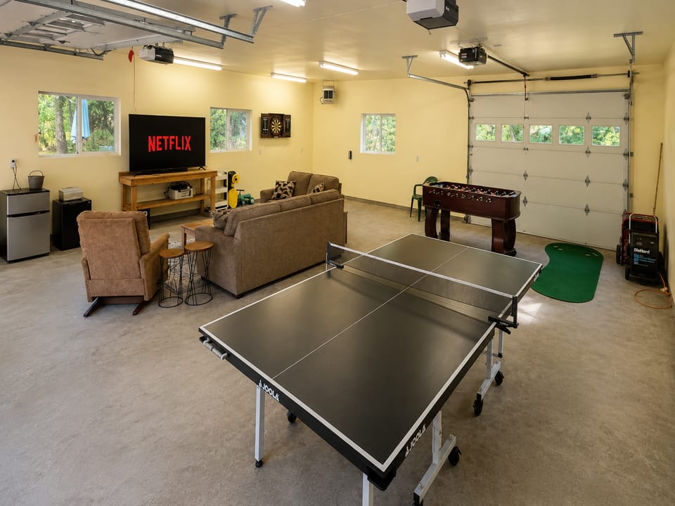 Game Room in Garage Space with Ping Pong and Foosball.