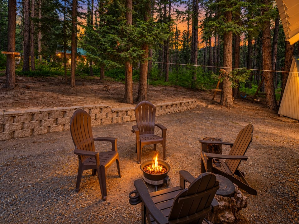 Propane Fire Pit for Smores or gathering round out back of the cabin.