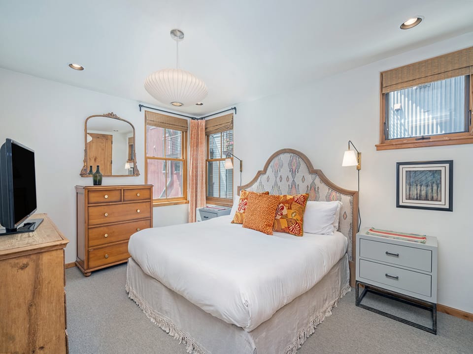 Primary King Bedroom offers lots of natural light and ensuite bathroom.