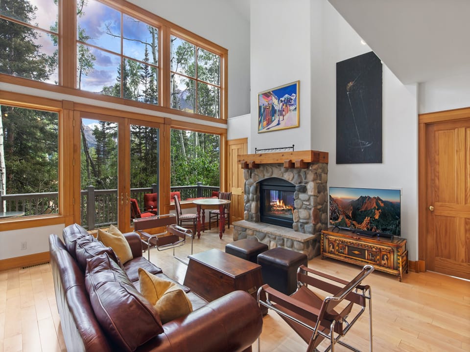 Beautiful Four Bedroom Family Home just a 7 minute walk to  Lower Double Cabins Ski Run. This Mountain Chalet offers stunning views and open living, located in a quiet Mountain Neighborhood.