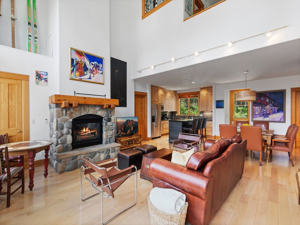 Beautiful Four Bedroom Family Home just a 7 minute walk to  Lower Double Cabins Ski Run. This Mountain Chalet offers stunning views and open living, located in a quiet Mountain Neighborhood.