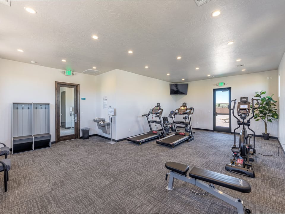When staying in our unit you have access to the neighborhood fitness center which includes treadmills, elliptical, bench, and free weights.