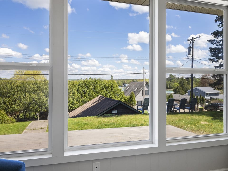 Nestled in Torch Lake Village with East-facing views - Enjoy the sunrise every morning!