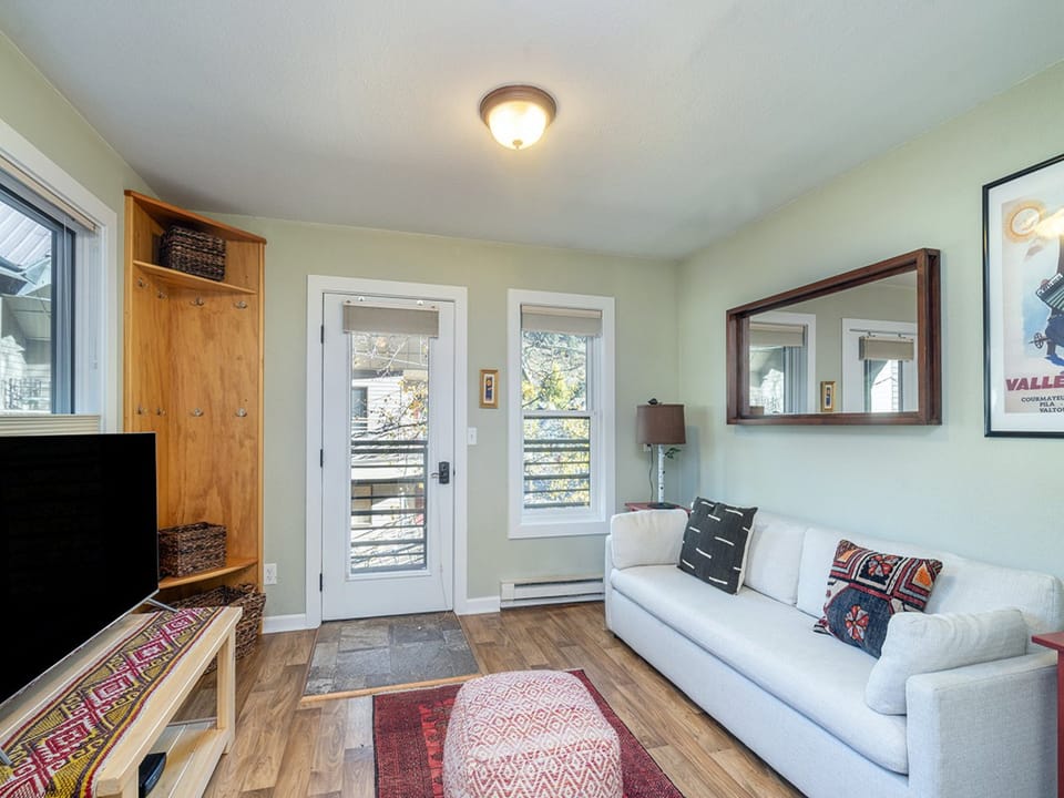 This living room couch pulls out to a double bed for extra room.