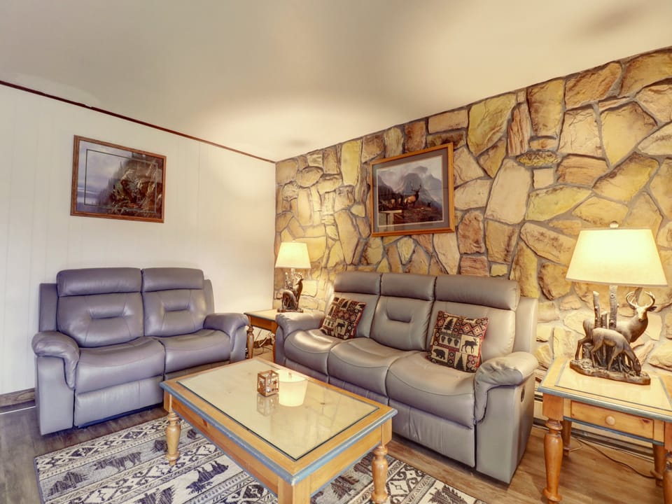 Open concept living room with cozy seating.