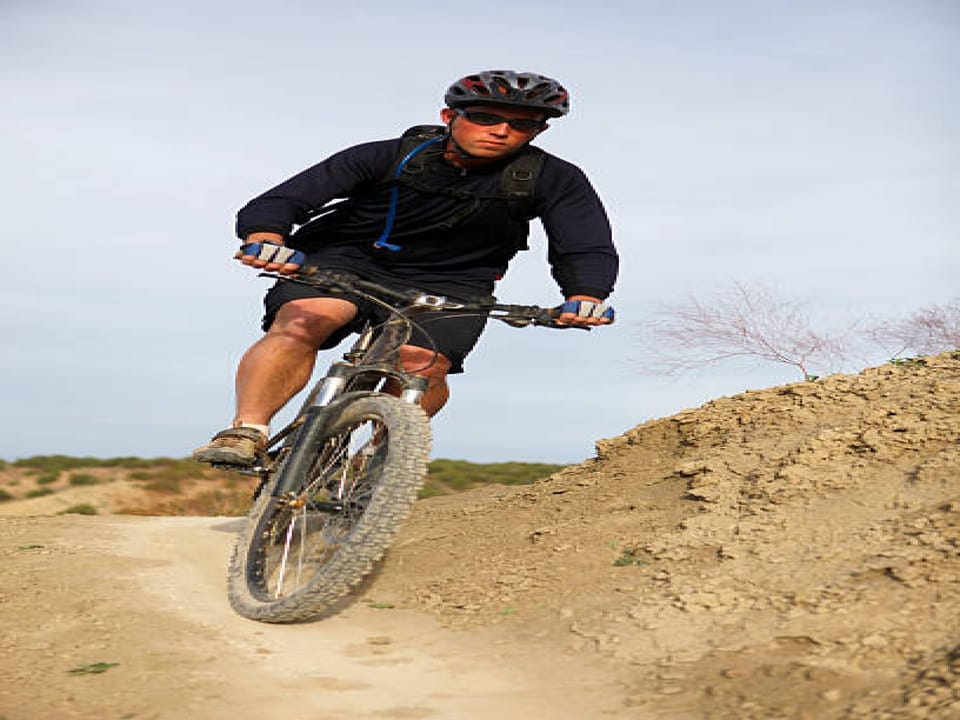 Adventure awaits with mountain biking trails near the property, perfect for exploring rugged terrain and scenic landscapes.