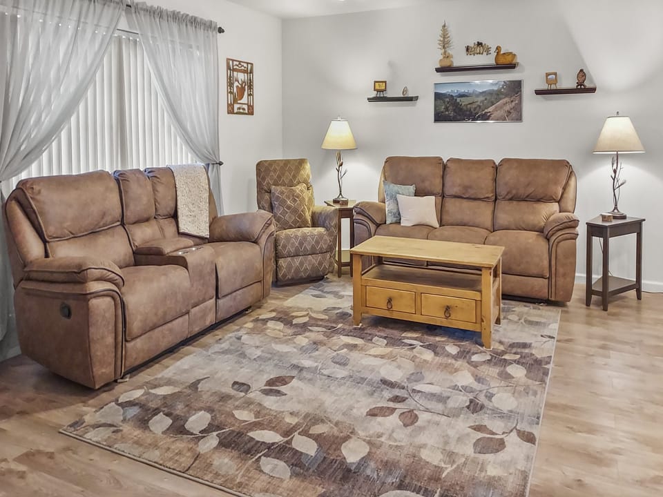 Spacious living room with open design to kitchen area