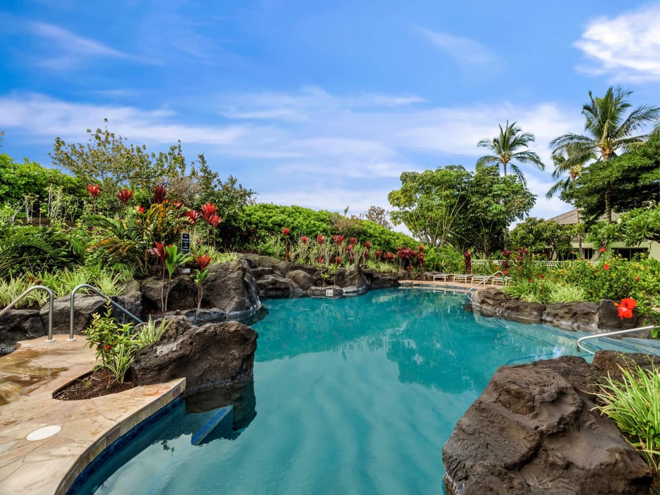 One of 2 pools in walking distance from your villa.