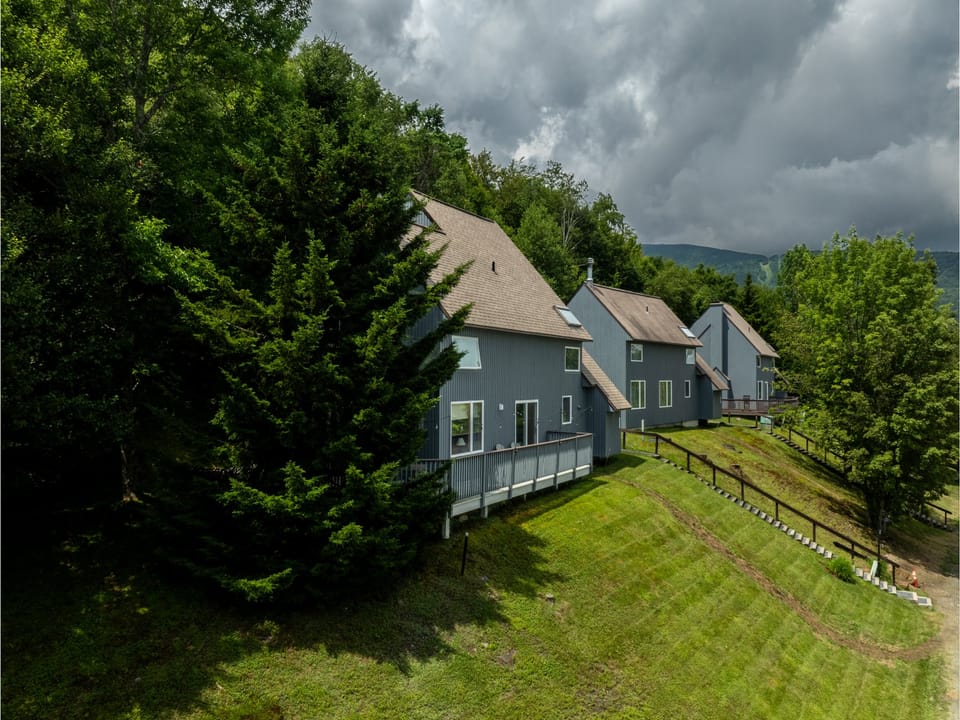 House is the end of the row of homes with a back yard and views of the resort