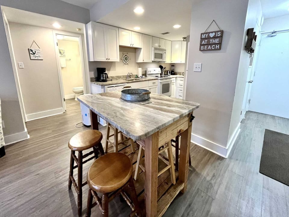 Nice dining table with granite counter.
