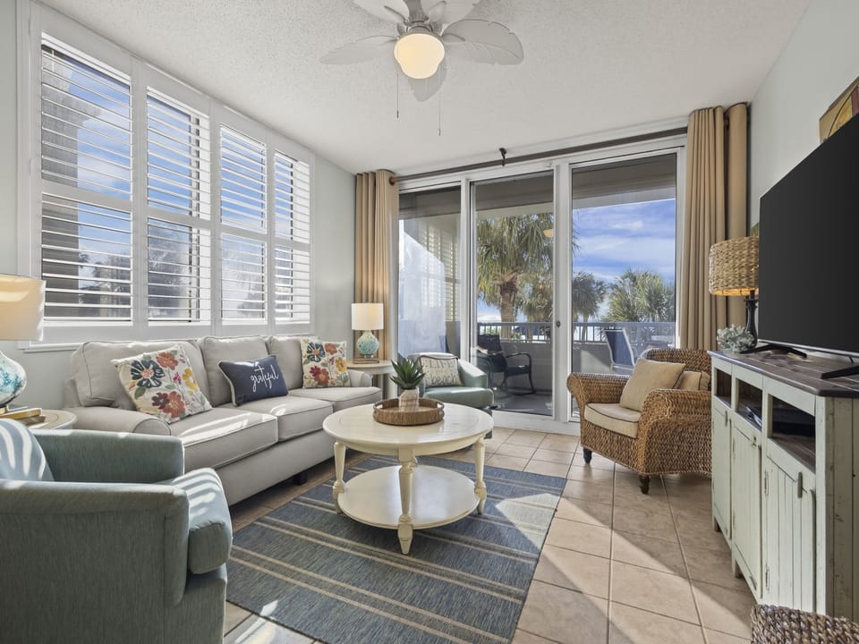 The open living area features plenty of comfortable seating and gorgeous, Gulf Front views!