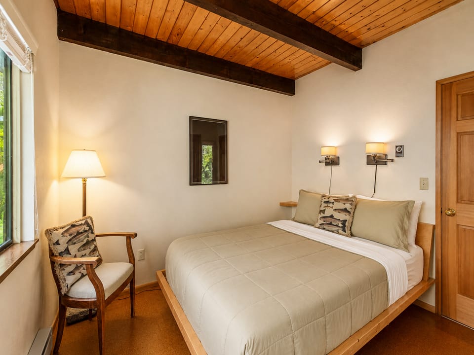 Main floor bedroom with Queen bed.