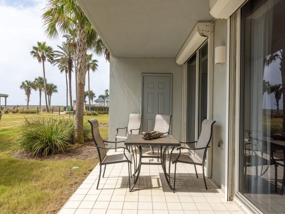 Unit 101 features a ground level, Beach Front patio. Seating is provided and offers a great space for enjoying your morning coffee or evening cocktails.