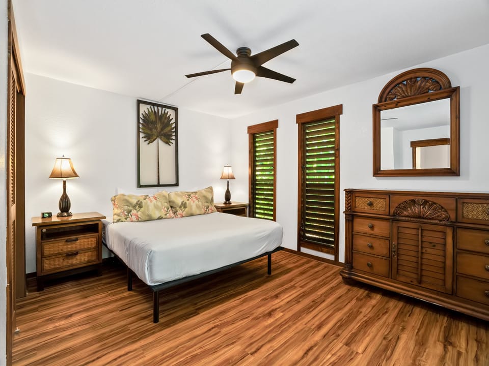 Simple comfort with a king bed, inspired by island vibes and rainforest dreams.