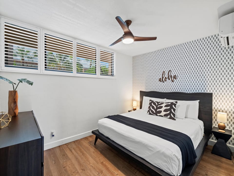 Primary bedroom features a king bed