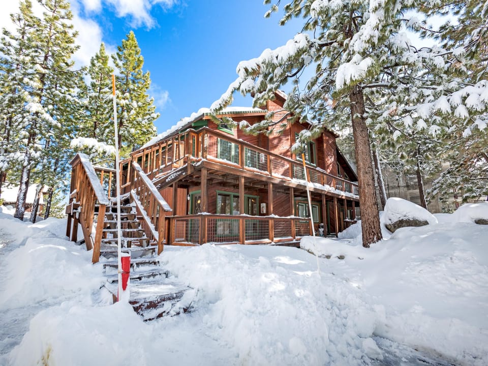 Your cozy Tahoe chalet, nestled among the pines and winter wonderland.
