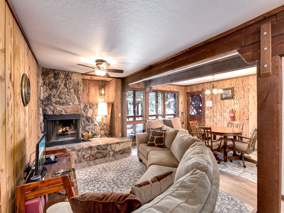 Open-concept design with a fireplace, ideal for unwinding in the evening.