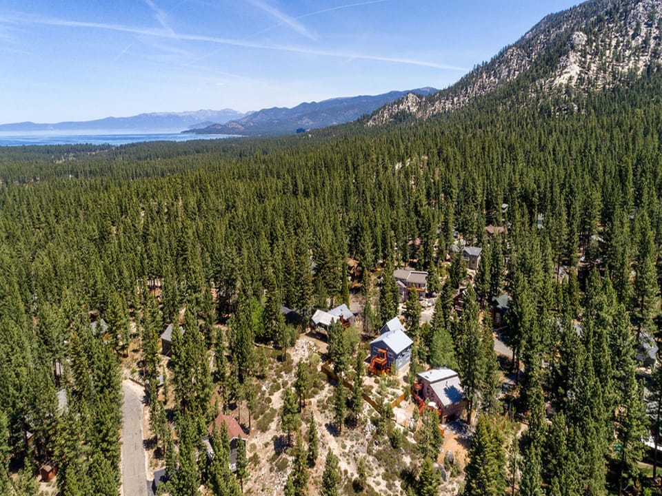 Towering pines and mountain peaks create a picture-perfect backdrop.