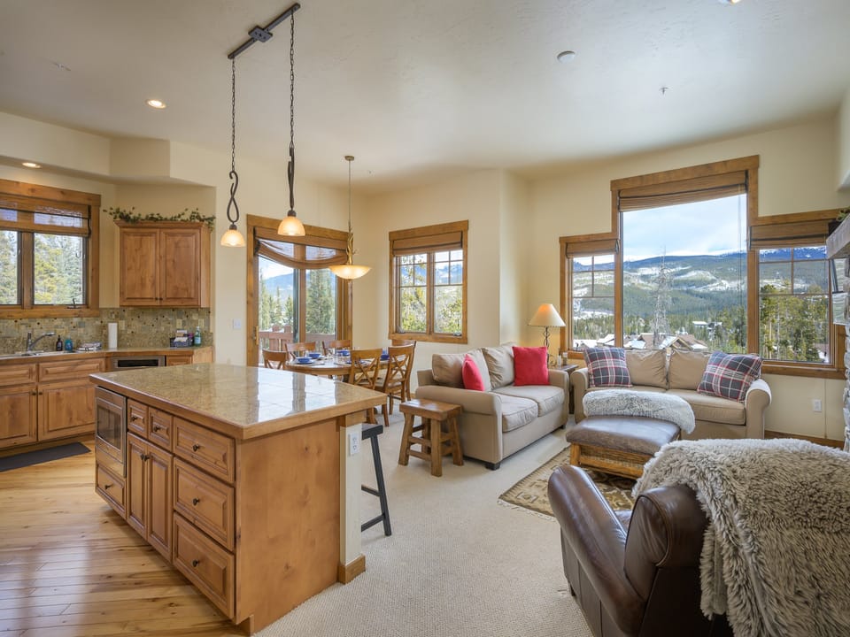 The open concept main floor has a large living room, a formal dining room, and a gourmet kitchen.