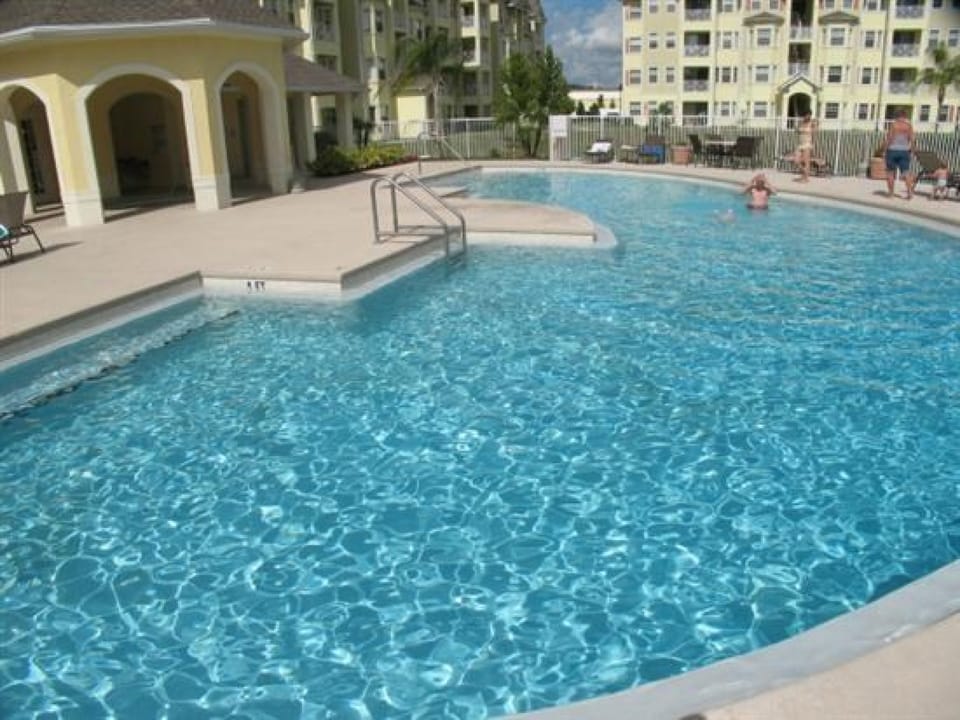 Dive into the sparkling pool, the perfect spot to cool off and relax under the sun.