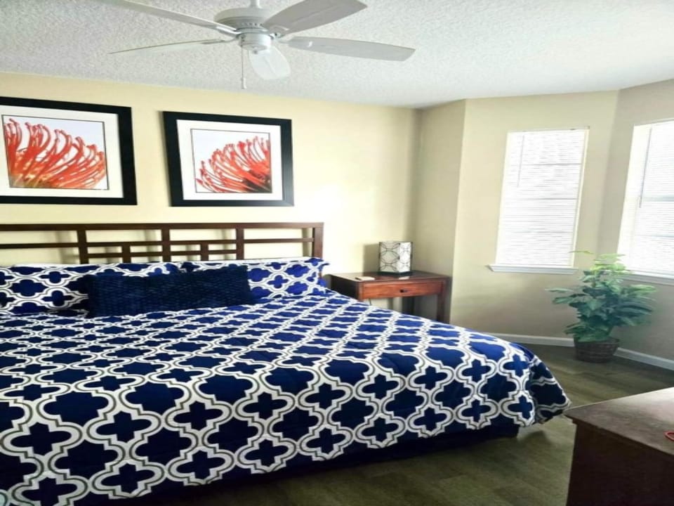 Enjoy a cozy night's rest in the stylish bedroom with modern decor and natural light.