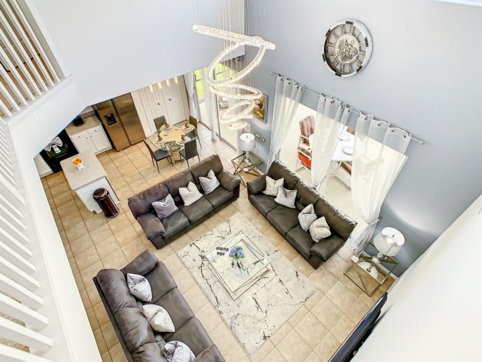Modern open-concept living space with elegant decor and ample seating for gatherings.
