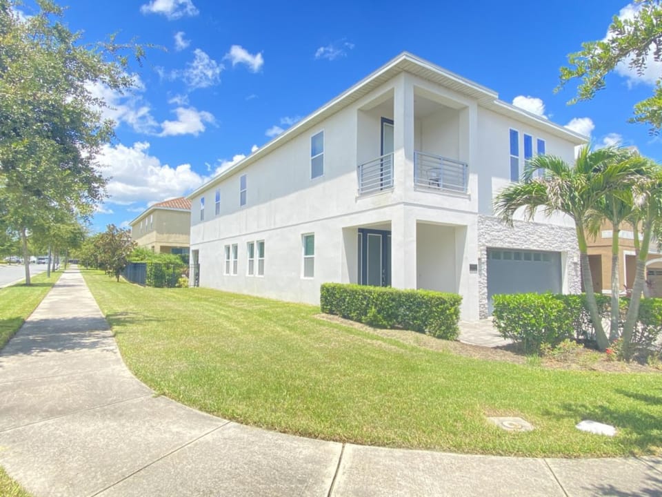 Modern architecture with spacious balconies and manicured landscaping.