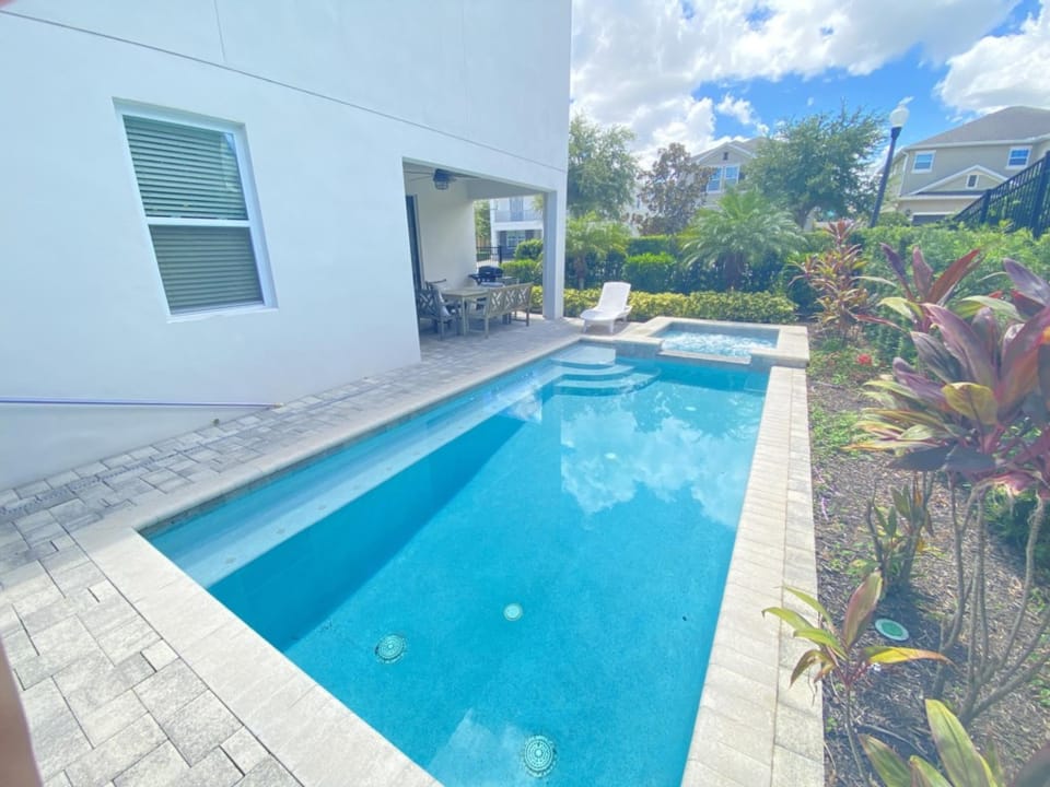 Relax by the private pool under sunny skies—your personal paradise.