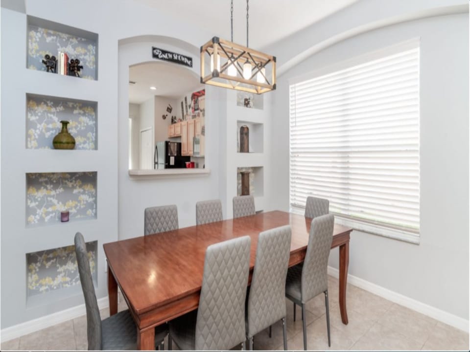 Elegant dining area with seating for eight, perfect for shared meals and conversations.