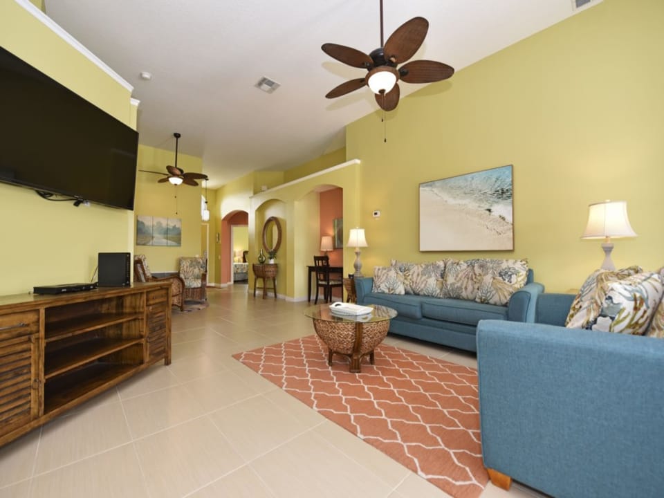Bright and cozy living area with modern decor and ample seating.