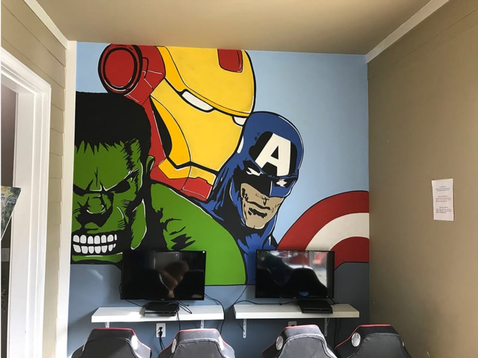 Fun Marvel-themed game room setup for entertainment and gaming nights.