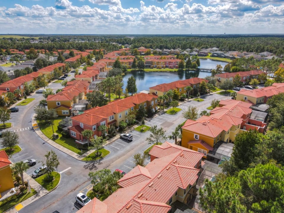 Picturesque community with red-tile rooftops and scenic water views for a charming atmosphere.