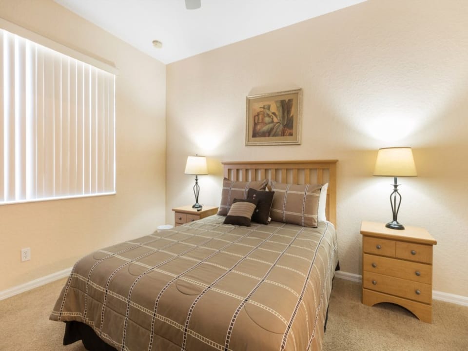 Cozy bedroom with warm lighting for a restful night’s sleep.