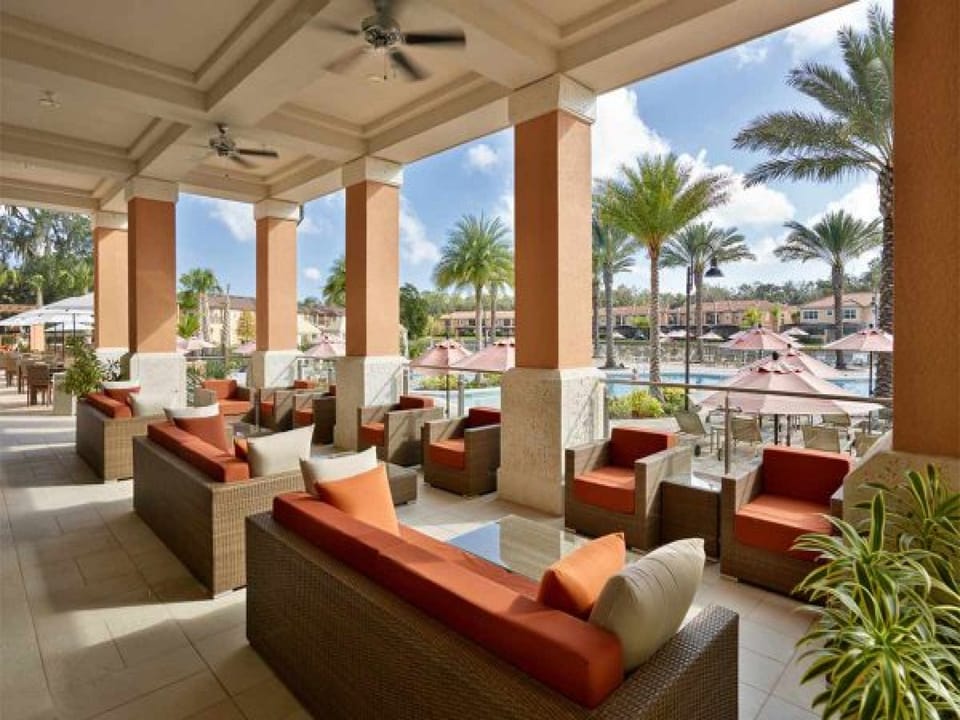 Stylish outdoor seating area with lush views and a refreshing breeze.