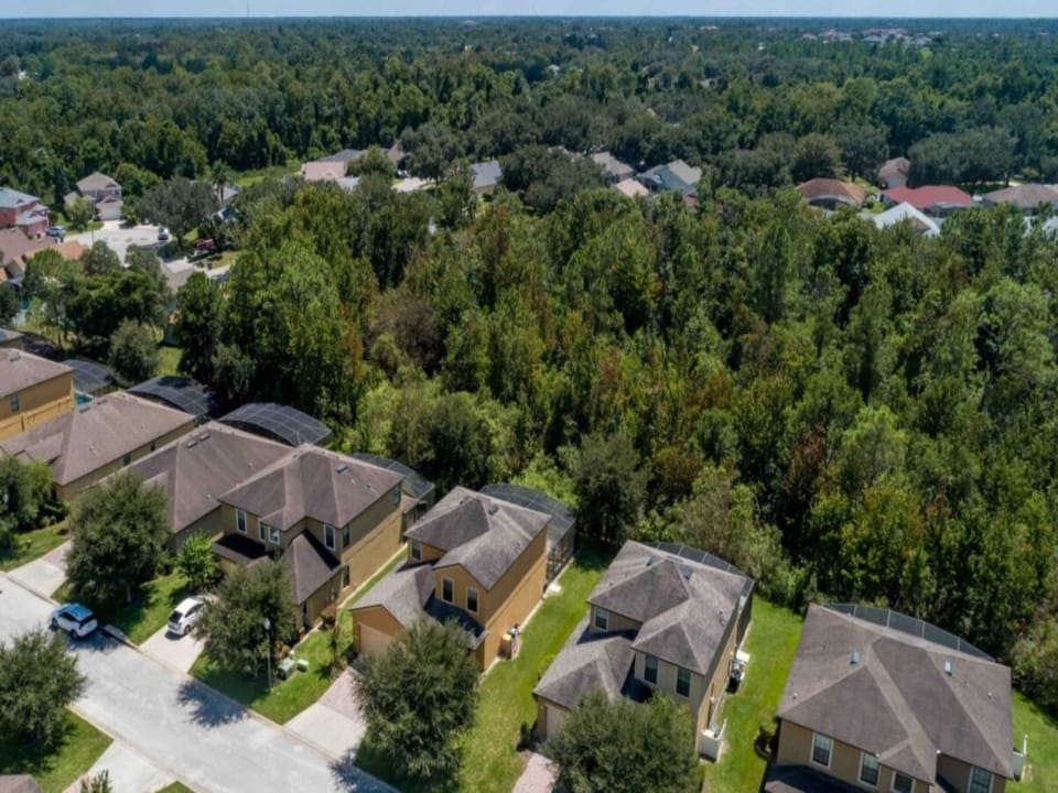 Scenic neighborhood surrounded by greenery, offering peace and privacy.