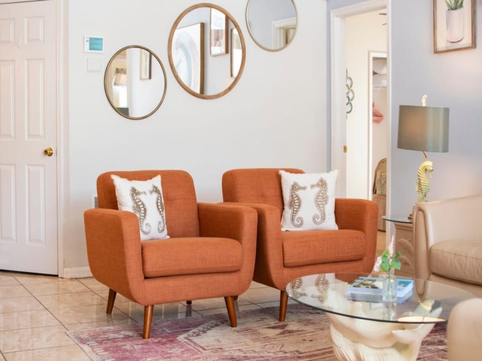 Stylish seating nook with modern decor for cozy conversations.